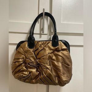 Valentino Garavani Gold lambskin leather w black patent leather trim